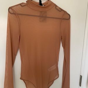 Orange sheer body suit